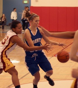 Liberty's Delane Agnew goes after a loose ball against Lakeside in the second round of the district playoffs Feb. 15.