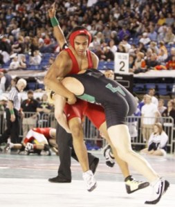 Lindberg's Isiah Corwin faced East Valley's Jacob Rodriguez in the second round of the state wrestling competition at the Tacoma Dome.  Corwin lead in points but lost by pin fall in the second round.