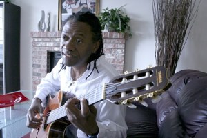 Brazilian musician Eduardo Mendonca plays the guitar at his home in Renton. Last weekend he became the first South American to receive the “Spirit of Liberty” award