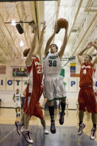 Eric Peterson goes up over Taylor Campbell of Mount Si Friday night.