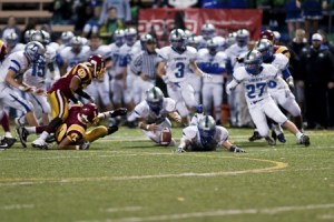 Liberty's Jay Chakravarty recovers an onside kick in the fourth quarter of the Patriots' 38-35 win against O'Dea Friday night.