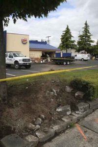 A vehicle crashed into the side of the Burger King restaurant on Sunset Boulevard North early Tuesday morning after coming through the intersection at North Third Street near Liberty Park.