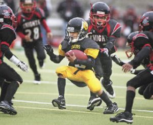 Jawann Gault is surrounded by defenders in the Benson Bruins’ division championship win Nov. 1 against the Knights at Auburn Memorial Stadium.