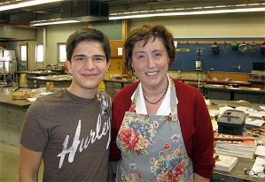 José Lins and his production art and jewelry class instructor Nanz Aalund at Hazen High School. Lins is a finalist in a national jewelry competition for a necklace  he made in Aalund's class.