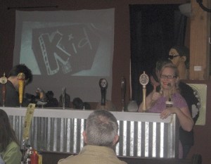 Columnist Carolyn Ossorio gives a thumbs up at The Berliner Tuesday night during the SIFF FilmWalk  that doubled as a date with husband Paul.