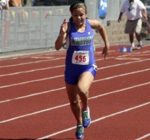 Liberty's Kelsey Werre runs in the 100-meter dash at the 3A state track meet. Werre ran in four different events at the state meet