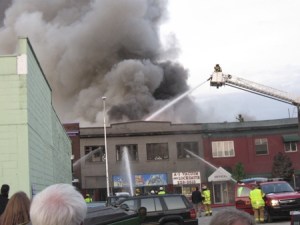 As black smoke rises