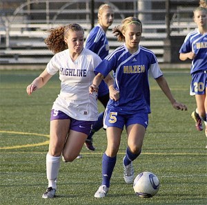 Hazen's Chelsea Delgado tries to clear the ball out against Highline Oct. 27.