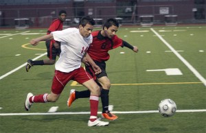 Renton’s Cristian Martinez battles for a ball with a Tyee defender March 29.