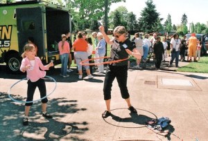 Mentee and Cascade Elementary student Krista Hendrickson hulas with mentor Wendy Kirchner