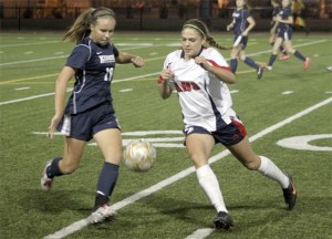 Lindbergh’s Lindsey Pfluger chases down a ball against Kennedy Sept. 18.