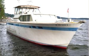 This boat was found grounded in Lake Washington in Kirkland Friday night and King County Marine Unit was searching Saturday for the registered owner