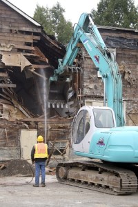 The roof of the sanctuary at the former Renton Lutheran Church on South Second Street is sliced through Monday morning. The church