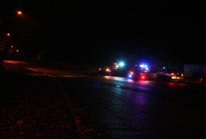 Renton Police Officers block off Renton Avenue South Monday night. Police surrounded a Skyway home in pursuit of the Lakewood shooter