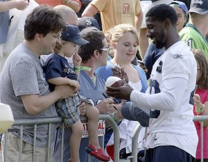 Seahawks players often sign autographs and spend time with fans after open training camp practice at the Virginia Mason Athletic Center.