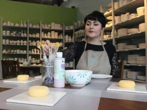 Glazed Arts studio helper Kandi Jackson prepares to get creative with some pottery.