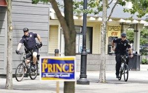 Two Renton Police officers ride through the Renton Transit Center just after a suspicious person was reported in the area Wednesday.