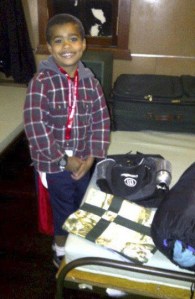 Max Whitney  of Renton was all smiles for his first overnight camp stay at Camp Eyabsut in North Bend.