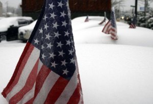 The American Flag was about that was showing above the snow at the lot at Brad Brotherton Cadillac GMC in Renton.
