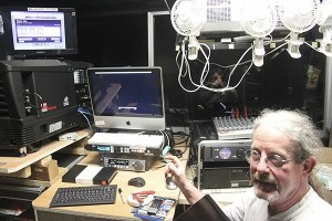 Miles McRae installed the digital projection equipment this week at the IKEA Performing Arts Center that will be used to show the films presented by the Seattle International Film Festival in Renton.