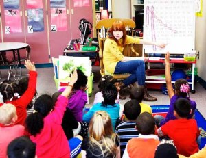Lakeridge Elementary School teacher Candace Abrahamson teaches her kindergarten students numbers during a recent class.