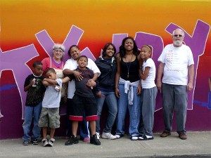 Community members gathered recently to repaint a mural in Skyway  at Martin Luther King Way S. and South 129th Street that had become a hot spot for graffiti.