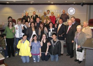 Renton schools superintendent Mary Alice Heuschel and Mayor Denis Law (holding the plaques) are surrounded by those who have somehow participated in the Renton-Nishiwaki Sister City relationship through committee work or exchanges to Japan. The city and the Renton School District received the 2010 Sister City Peace Prize in recognition of how it celebrated the 40th anniversary of its relationship with Nishiwaki in 2009.