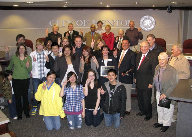 Renton schools superintendent Mary Alice Heuschel and Mayor Denis Law (holding the plaques) are surrounded by those who have somehow participated in the Renton-Nishiwaki Sister City relationship through committee work or exchanges to Japan. The city and the Renton School District received the 2010 Sister City Peace Prize in recognition of how it celebrated the 40th anniversary of its relationship with Nishiwaki in 2009.