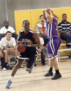 Tony Wroten drives around a defender at a Jamal Crawford Summer Pro-Am Basketball League game Aug. 6.
