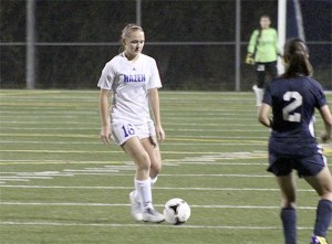 Hazen freshman Erin Zetterberg brings the ball over the middle against Lindbergh Oct. 18.