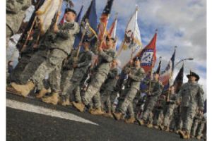 The U.S. Army State and Territorial Flag marching unit participated in the regional Veterans Day parade in Auburn on Saturdah.