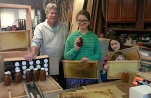 Renton beekeeper Brian Overmanm left