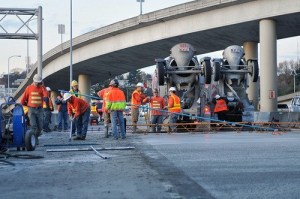 Crews pour concrete panels on southbound I-5 near I-90 during the first weekend of the I-5 Seattle to Shoreline pavement repair project in 2009.