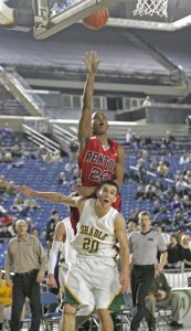 Renton's Justin Bennett makes a shot in the first round of the 3A state tournament.