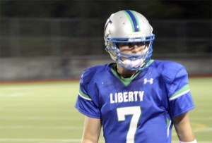 Liberty quarterback Trey Wheeler passed for three touchdowns