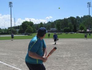 Members of the Puget Sound Senior Co-ed Softball League get in a game at Liberty Park during Tuesday morning’s sunshine. The league is made up of players from senior centers from Bellevue to Sumner and all more than 50 years old.