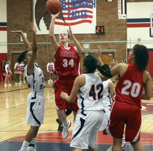 Renton's Taylor Farris puts up a shot against Lindbergh earlier this season.