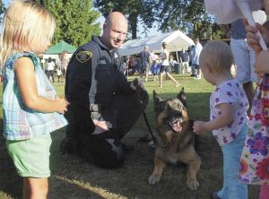 K-9 officer Boss and his handler Jason Trader made lots of new friends during the Aug. 7 National Night Out event at Philip Arnold Park.