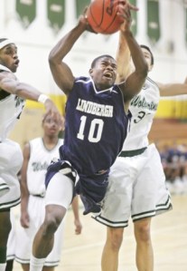 Lindbergh's Willie Creear splits Evergreen defenders Michael Fiso