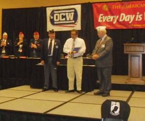 Renton Municipal Court Judge Terry Jurado accepts a special Lifesaving Award at the American Legion's Department of Washington Annual Convention in Yakima July 20.