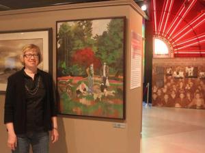 Museum Director Liz Stewart poses near 'Park Sense III