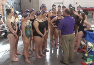 Lindbergh swim coach Roger Miron addresses his undefeated team during a practice Oct. 25.