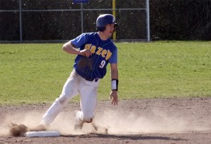 Hazen second baseman John Wall slides into second against Renton.