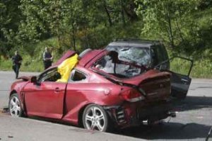 A man estimated in his 20s was killed at about 2:15 p.m. Friday in a two-car collision in the 2400 block of the Maple Highway