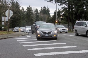 Morning commuters queue up to make the turn from North 30th Street to I-405 North on a recent morning.