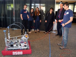 The Lindbergh Robotics team demonstrates their robot Monday at the fifth annual Friends of Renton Schools breakfast.