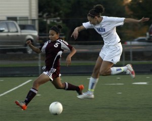 Hazen's Kayla Hackman goes after a ball against Enumclaw Nov. 3.