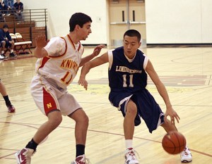 Lindbergh's Jimmy Keum drives against Newport Dec. 29.