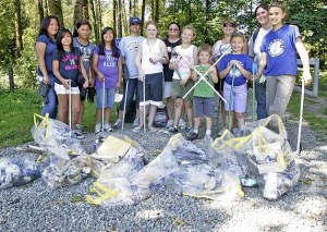 Volunteers and Girl Scout Troops from left