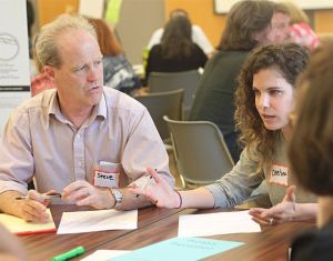 Residents discuss the issues during a King County Opioid Task Force public meeting Tuesday in Renton.